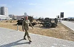 Ilham Aliyev in front of the seized equipment