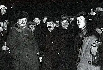 Leon Trotsky, Lev Kamenev and Grigory Zinoviev with a group of other people