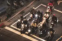 Ten motorcycles are stopping at motorcycle stopping area