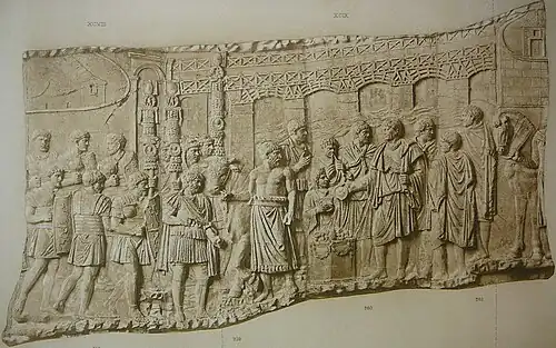 "The Reliefs of Trajan's Column by Conrad Cichorius. Plate number LXXII: Arrival of Roman troops (Scene XCVIII); The emperor sacrifices by the Danube (Scene XCIX); Trajan receives foreign embassies" (aquila at the upper left)