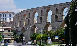 Kavala aqueduct near Nikotsara Square showing the curve of the structure from street level