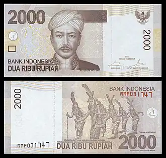 Image 9 Indonesian rupiah Banknotes: Bank of Indonesia The rupiah is the national currency of Indonesia. Introduced in 1946 by Indonesian nationalists fighting for independence, the currency replaced a version of the Netherlands Indies gulden which had been introduced during the Japanese occupation in World War II. In its early years the rupiah was used in conjunction with other currencies, including a new version of the gulden introduced by the Dutch. Since 1950, it has had a lengthy history of inflation and revaluation. As of August 2018[update] '"`UNIQ--nowiki-0000001E-QINU`"' , the currency—which is issued and controlled by the Bank of Indonesia—is trading for more than 14,600 rupiah to the United States dollar. This note, denominated 2,000 rupiah, is part of the 2009 series. It depicts Prince Antasari, a National Hero of Indonesia, on its obverse, and a traditional Dayak dance on its reverse. See other denominations: Rp&nbsp;1,000, Rp&nbsp;5,000, Rp&nbsp;10,000, Rp&nbsp;20,000, Rp&nbsp;50,000, Rp&nbsp;100,000 More selected pictures