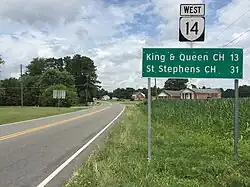View west along Virginia State Route 14 (The Trail) at Virginia State Route 33 (Lewis B Puller Memorial Highway) in Shacklefords