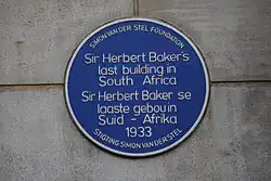 plaque reads "Sir Herbert Baker's last building in South Africa", then the same in Afrikaans