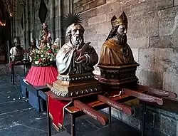 Processional litters with busts of Bartholomew, Hubert & others, cloisters of Our Lady's