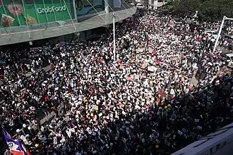 2021 Myanmar coup d'état culminated an ongoing protests, thousands of protesters participating in an anti-junta rally in Yangon in February 2021.