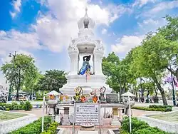 Statue of the Goddess of Earth squeezing water out of her hair bunt