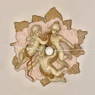 Beaux Arts – Stucco with putti on a ceiling in Piața Romană no. 3, Bucharest, by Siegfired Kofsinski and C. Crețoiu, 1912