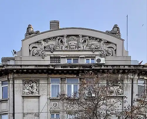 Art Deco cornucopias on the pediment corners of the Mihai Zisman House (Calea Călărașilor no. 44), Bucharest, by architect Soru, 1920