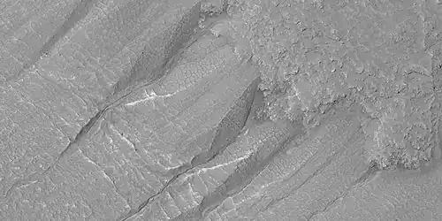 Close view of gullies in crater, as seen by HiRISE under HiWish program. Polygons are visible in this close view.