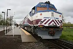 An Altamont Commuter Express train leaving Pleasanton Station