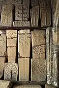 A group of 13th century cross slabs in the church porch at Bakewell, Derbyshire.