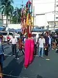 Stilt walker in Bangladesh