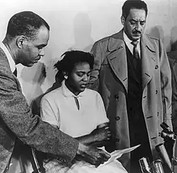 Roy Wilkins in press conference with Autherine Lucy and Thurgood Marshall, director and special counsel for NAACP Legal Defense and Education Fund. Autherine Lucy was the first African-American student to attend the University of Alabama who later expelled her.