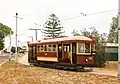 Type C ("Desert Gold" or "Bouncing Billie") tram no.&nbsp;186, built 1919, leaves Shell Street, St Kilda