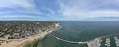 Aerial panorama of Middle Brighton Pier and its fleet of yachts.jpg