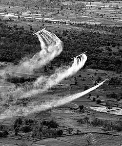 Three U.S. Fairchild UC-123B aircraft spray Agent Orange as part of the overall herbicidal warfare operation in Vietnam called Trail Dust, circa 1962–1971