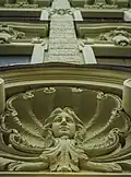 Close-up of a decorative element on the facade of Alberta street 9, Riga