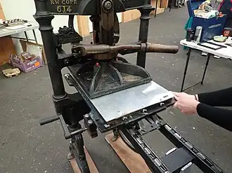 Moving the covered set type under the platen