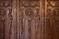 Carvings in wooden wall panels on the walls of the Collector's Office