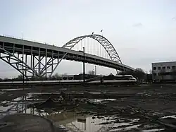 An Amtrak train passing beneath the Fremont Bridge