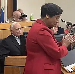 Bellotti listens as Massachusetts Attorney General Andrea Campbell speaks in recognition of his 100th birthday on May 3, 2023