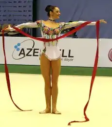 Bessonova holds a ribbon