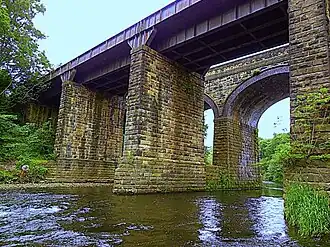 Stone railway viaducts straddling a river