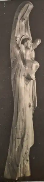 Wooden sculpture of "Mother Mary holding Infant Jesus near her womb"