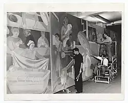 The artist Abraham Lishinsky and his assistants working on a mural for the World's Fair