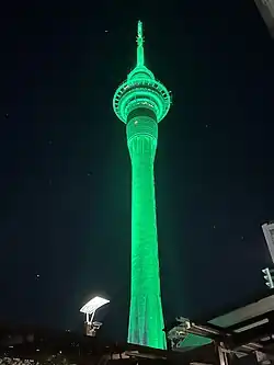 The Sky Tower illuminated green