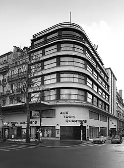 Expressionist architecture influences – Aux Trois-Quartiers department store in Paris, by Louis Faure-Dujarric (1932)[70]