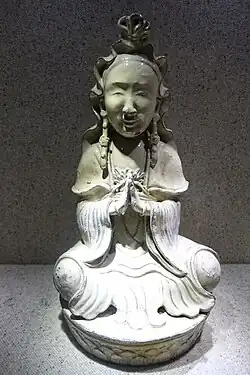 Quán Âm (Avalokiteśvara) figurine, Bát Tràng kiln, Hanoi, Nguyễn dynasty, 19th century CE, white glazed ceramic - Vietnam National Museum of History, Vietnam
