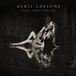 A black-and-white photo of a nude Avril Lavigne sitting in a pool of water while holding an acoustic guitar close to her body. Her name and the album title are written above.