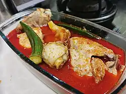 Asam pedas ayam, a regional variation from Johor, Malaysia, substituting chicken for fish