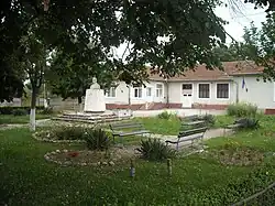 Bust of Petru Groza in front of the Băcia community center