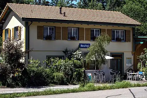 Two-story building with gabled roof