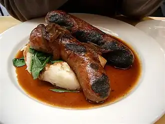 "Bangers and mash": sausages, from Roman times[57][58] and mashed potato (1588–1593)[59]