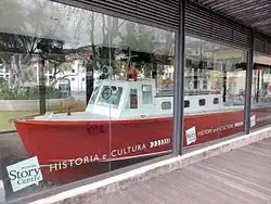 Boat used to take passengers from the seaplane operated by Aquila Airways, on display in Almirante Reis Park, Funchal