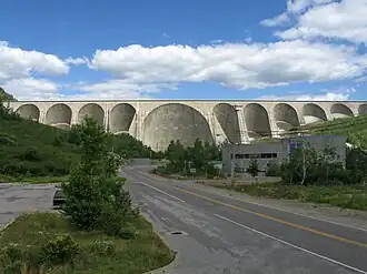 A large concrete dam with multiple arches