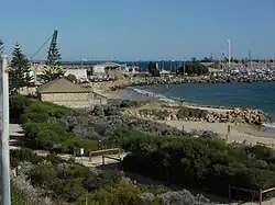 Bathers Beach location – taken from the north – the building in mid-left, fishing boat harbour behind