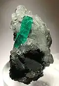 Muzo emerald on calcite 5.3 cm × 3 cm × 3 cm (2.1 in × 1.2 in × 1.2 in)