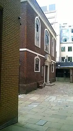 A colour photograph of a brick building