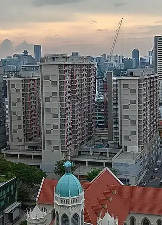 Mixed-use HDB block with void deck and playground