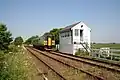 Blotoft signal box (Helpringham)with a Class 153 unit passing.[38][page&nbsp;needed]