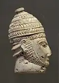 Head of a warrior; 1300-1200 BC; ivory; height: 8 cm; National Archaeological Museum (Athens)[14]