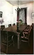 Conference table and chairs with chandelier