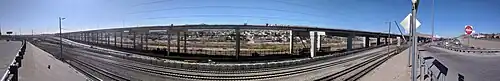 January 2019 view of another segment, from the Porfirio Diaz Street–Interstate 10 interchange ramp. The border fence, Rio Grande, and Ciudad Juarez are visible under the new elevated roadway.