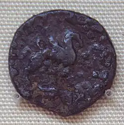 Bronze coin of Wima Kadphises with camel, found in Khotan.
