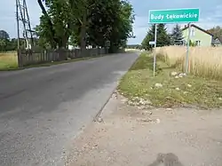 Road sign leading to the village